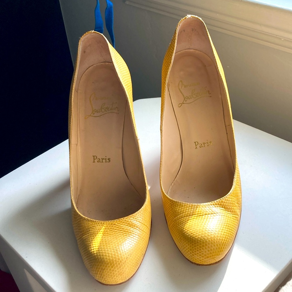 Christian Louboutin yellow snakeskin pumps